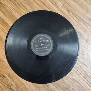 Glenn Miller And His Orchestra – In The Mood / A String Of Pearls 1955 V+/V+